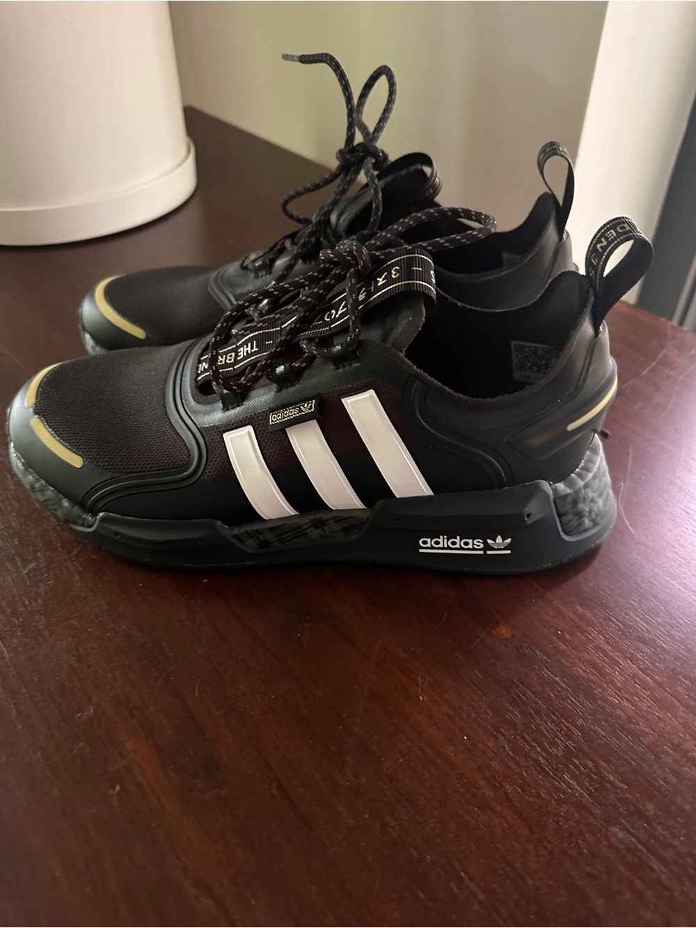 Adidas Men’s Black Sneakers with Gold Accents